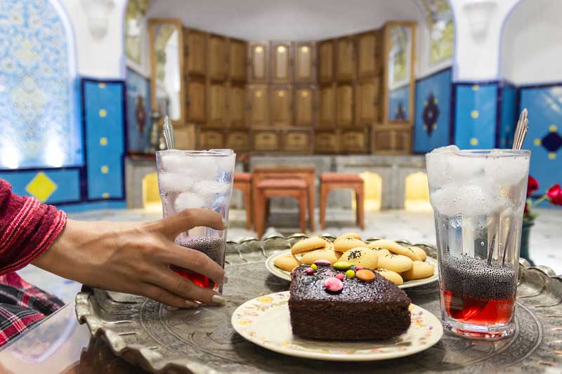 Compassimo-A visitor enjoying their time in Qazi Hammam-Isfahan