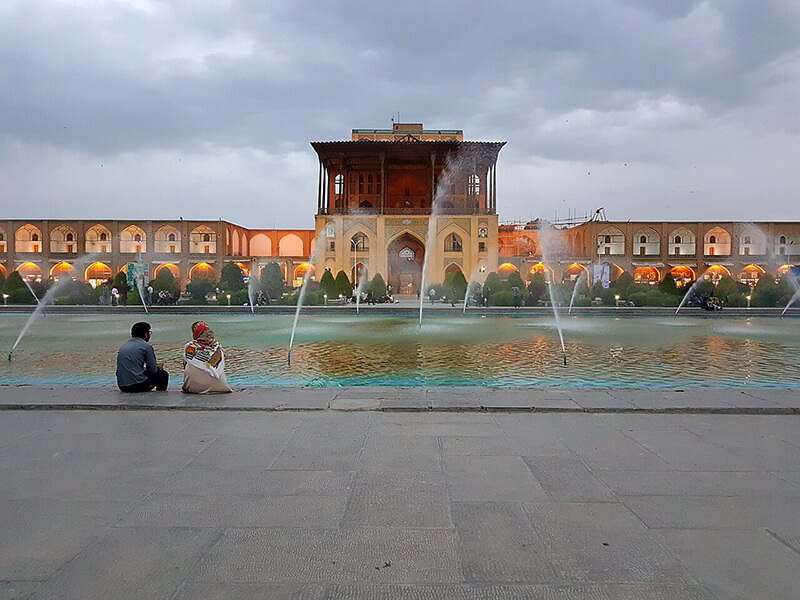 Compassimo-Local enjoying an afternoon in Naqsh-e Jahan Square in front of Ali Qapu Palace-Isfahan