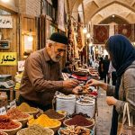Compassimo-Local shopkeeper offering dried fruits to a tourist-Shiraz Bazaar