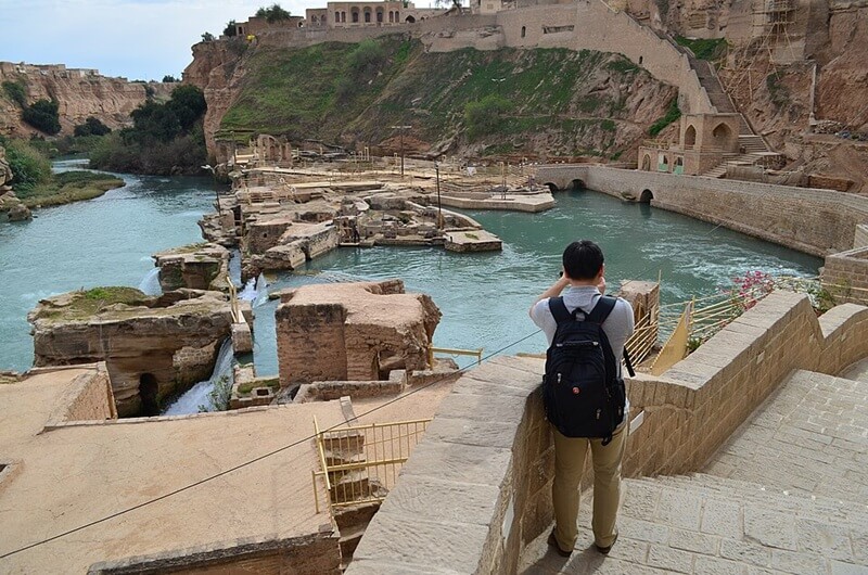 Compassimo-Tourist Taking Photos in Shushtar Historical Hydraulic System-Shushtar-Ahvaz